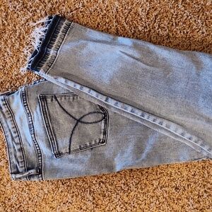 Calvin Klein light wash distressed hem womans size 30 jeans